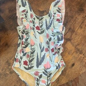 Pink Chicken Cream and Blue Swimsuit